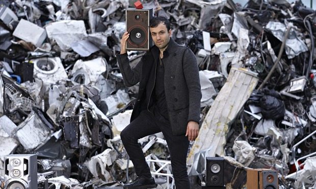 Paul Cocksedge at the Sweeep recycling centre in Kent with his device The Vamp (in red) which can tr